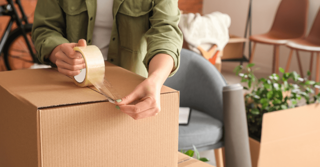 A man packing a box