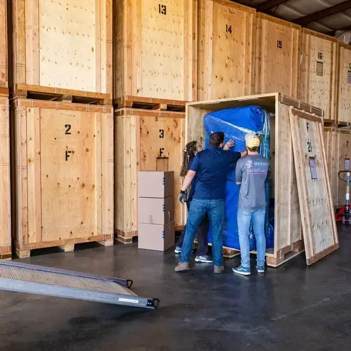 Person organizing boxes in a storage unit