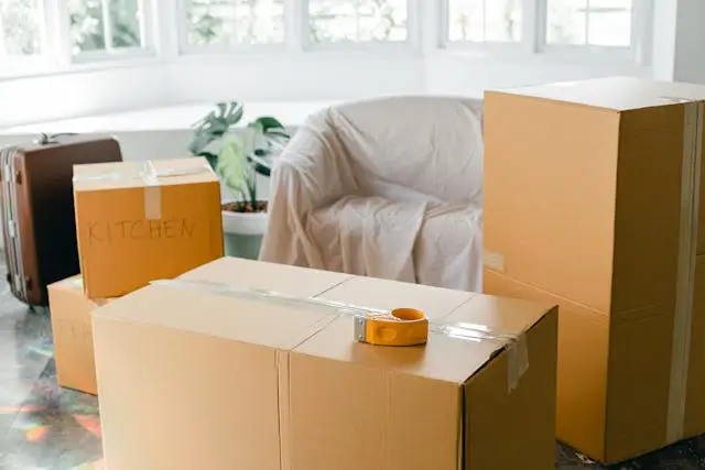 Professional movers providing Sacramento packing services using high-quality moving boxes and wrapping materials